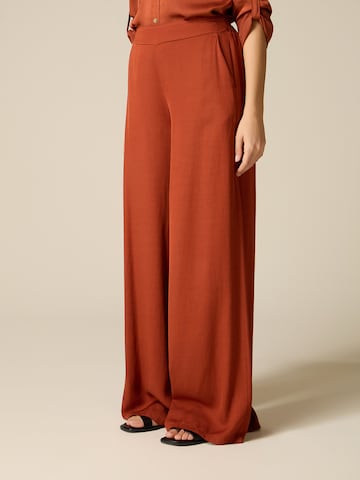 oltre Baggy Trousers in Orange