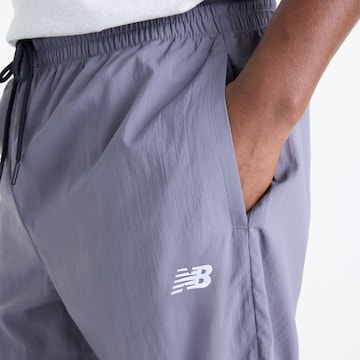Loosefit Pantaloni 'Sport Legacy Pant' di new balance in grigio