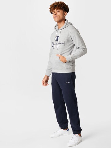 Champion Authentic Athletic Apparel Zwężany krój Spodnie w kolorze niebieski