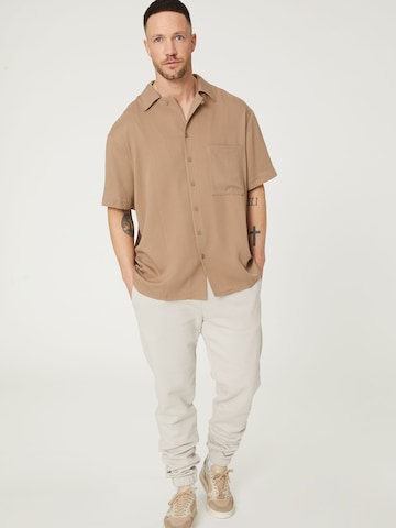 Coupe regular Chemise 'Enes' DAN FOX APPAREL en beige