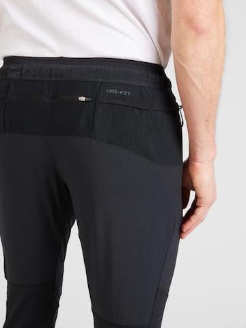 NIKE Regular Workout Pants in Black