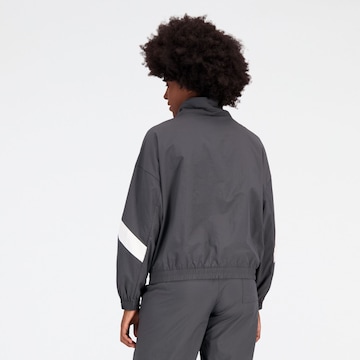 new balance Prehodna jakna 'Athletics' | siva barva
