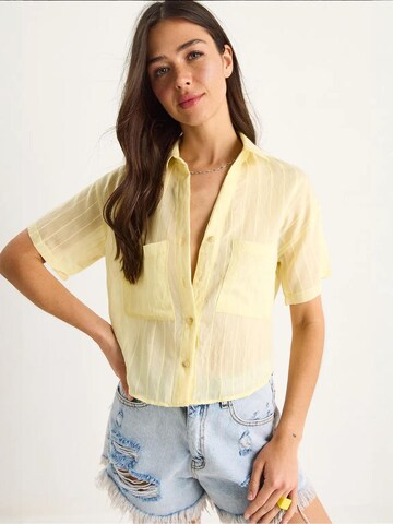 Bianco Lucci - Blusa em amarelo: frente
