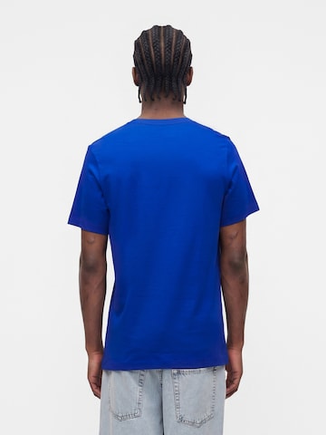 Regular fit Tricou 'CLUB' de la Nike Sportswear pe albastru