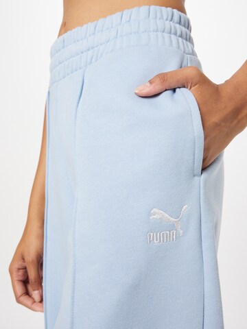 PUMA Tapered Sportbroek in Blauw