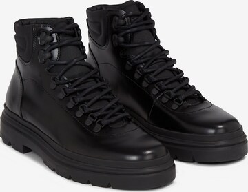 Calvin Klein Lace-Up Boots in Black