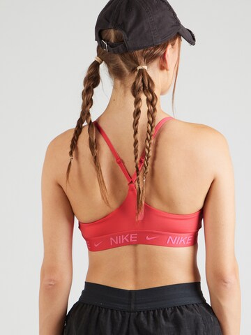 Bustier Soutien-gorge de sport 'INDY' NIKE en rose