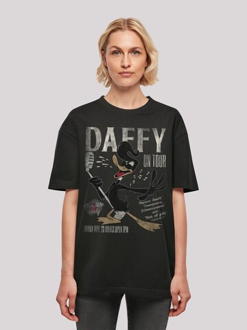 F4NT4STIC Oversized shirt 'Looney Tunes Daffy Duck Concert' in Zwart: voorkant