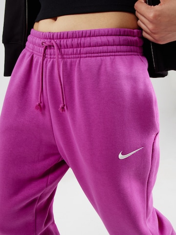 Nike Sportswear Tapered Hose 'PHNX FLC' in Pink