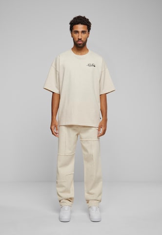 Karl Kani Loose fit Jeans in Beige