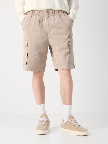 Calvin Klein Jeans Regularen Kargo hlače | rjava barva: sprednja stran