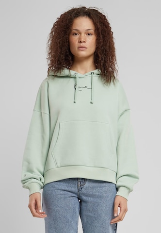 Sweat-shirt Karl Kani en vert : devant