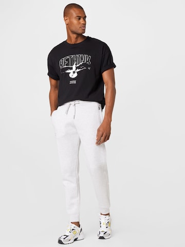 Effilé Pantalon Superdry en gris