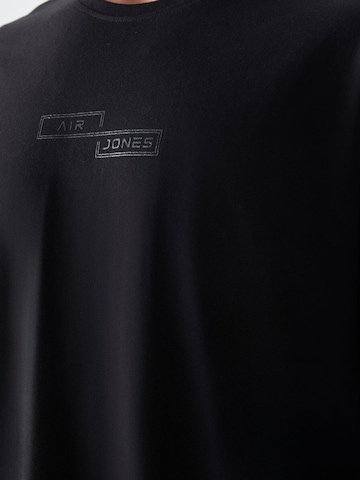 Tommy Life T-Shirts in Schwarz