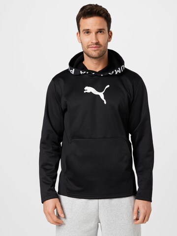 PUMA - Camiseta deportiva en negro: frente