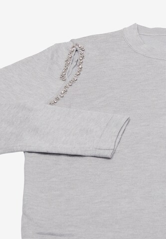 Pull-over carato en gris