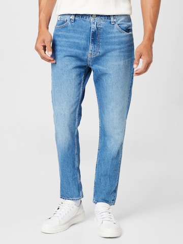 Calvin Klein JeansTapered Traperice - plava boja: prednji dio