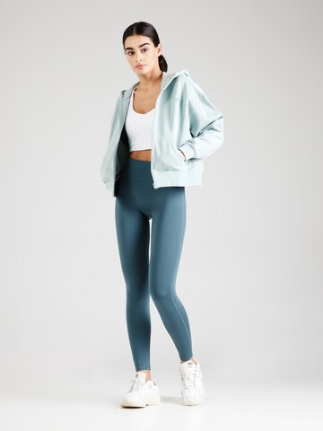 Fabletics Skinny Sportbyxa 'ANYWHERE MOTION' i grön