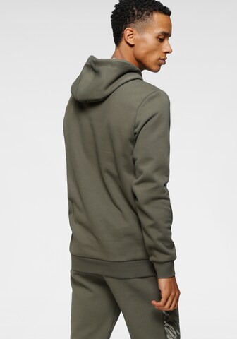 PUMA Sweatshirt in Green