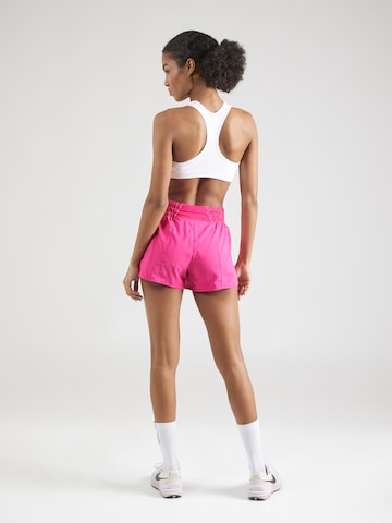 Regular Pantalon de sport NIKE en rose