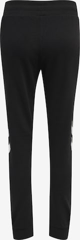 Effilé Pantalon de sport Hummel en noir