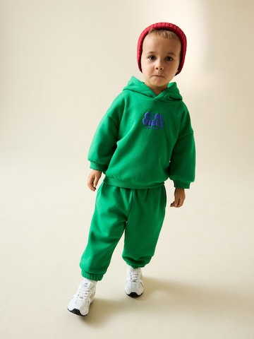 Next Szettek - zöld: elől