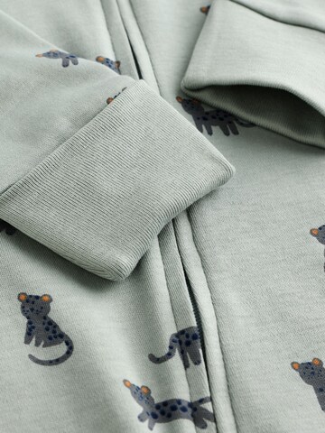 Pijamale de la Next pe bej