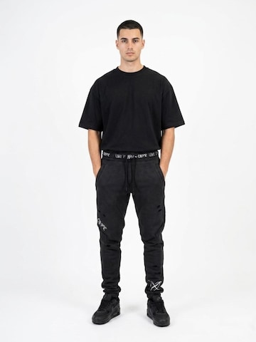ENVYME Shirt 'T-Shirt Oversize T-Shirt „Don't Be Average" Print, Vintage Used-Look' in Black: front