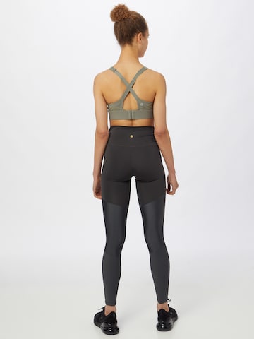Skinny Pantaloni sportivi 'Kachel' di Athlecia in grigio