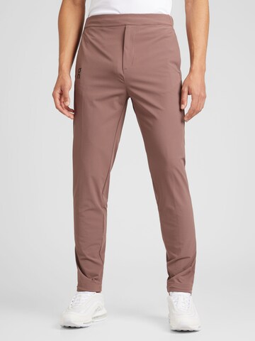 On Regular Trousers in Brown: front