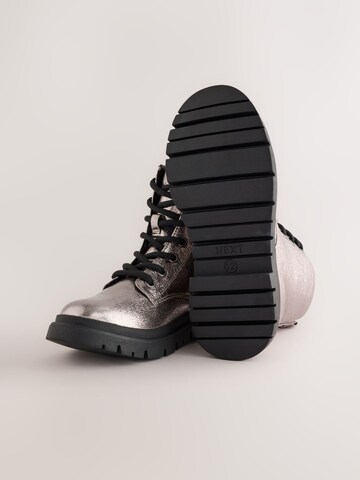 Bottes Next en argent