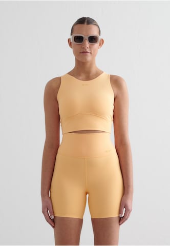 Bustier Soutien-gorge de sport 'Sense' Aim'n en orange : devant