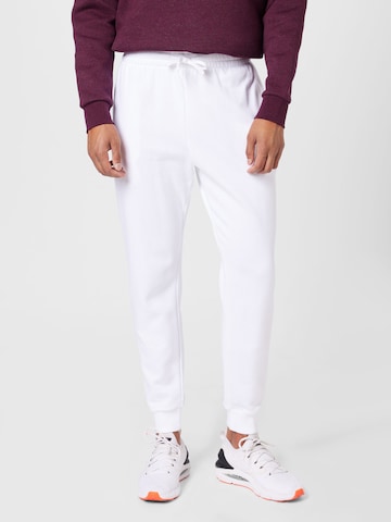 UNDER ARMOUR - Tapered Pantalón deportivo en blanco: frente
