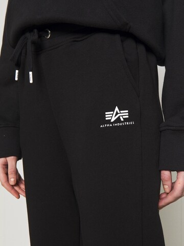 ALPHA INDUSTRIES Zúžený Kalhoty – černá
