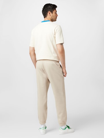 ADIDAS ORIGINALS Tapered Trousers 'Premium Essentials' in Beige