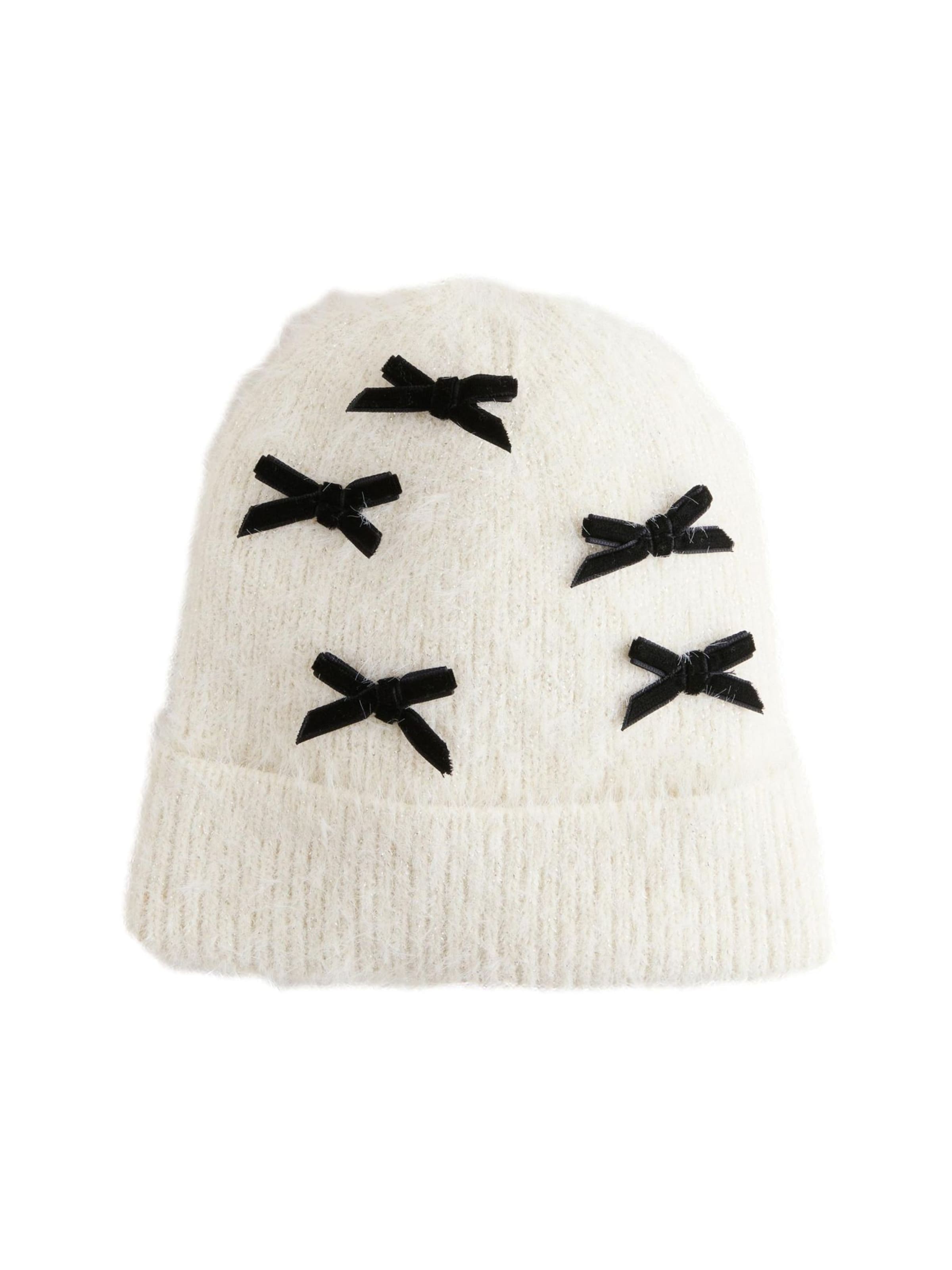 Next Muts in Wit: voorkant