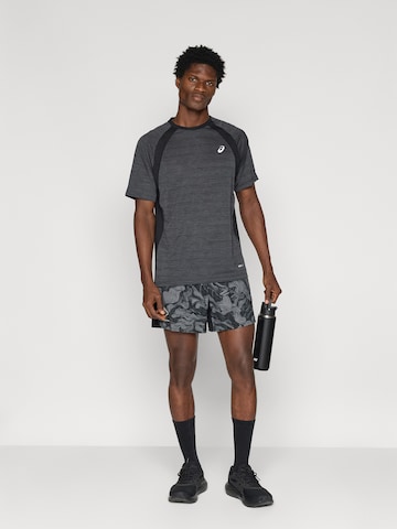 T-Shirt fonctionnel 'ROAD' ASICS en noir