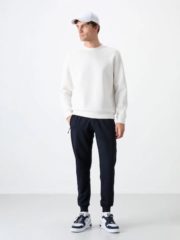 Tommy Life Tapered Workout Pants 'Jogginghose' in Blue