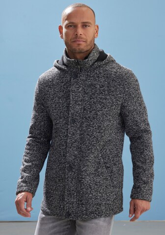 JOHN DEVIN Strickjacke in Schwarz: Vorderseite