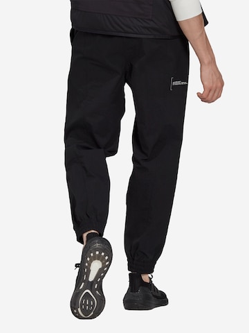 ADIDAS SPORTSWEAR Zwężany krój Spodnie sportowe w kolorze czarny