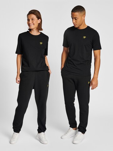 Regular Pantalon de sport 'Amnesty' Hummel en noir