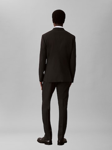Coupe slim Pantalon à plis Calvin Klein en noir