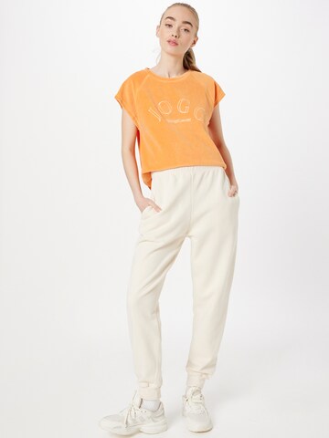 Sweat-shirt 'AROSE' The Jogg Concept en orange