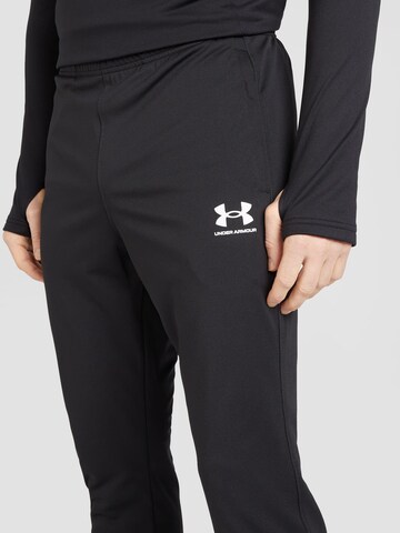 UNDER ARMOUR Regular Workout Pants in Black