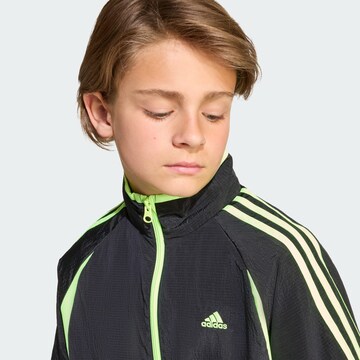 ADIDAS ORIGINALS Between-season jacket 'Teamgeist' in Black