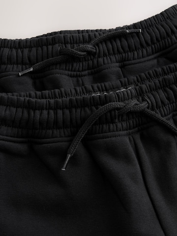 Next Zúžený Kalhoty – černá