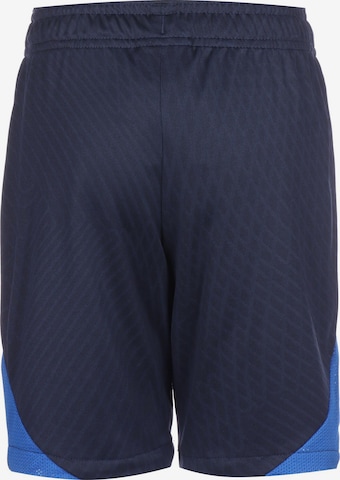 NIKE Loose fit Workout Pants in Blue