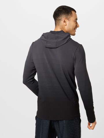 Tricou funcțional 'Seamless Lux' de la UNDER ARMOUR pe negru