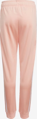 Effilé Pantalon ADIDAS ORIGINALS en rose