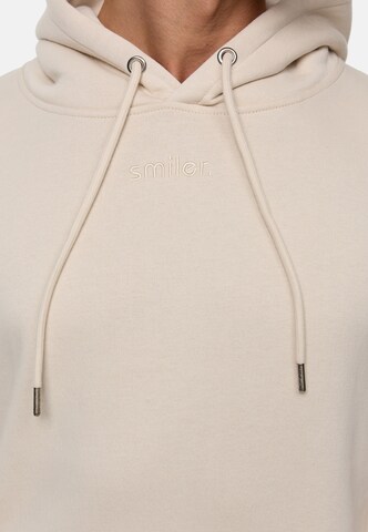 Sweat-shirt smiler. en beige